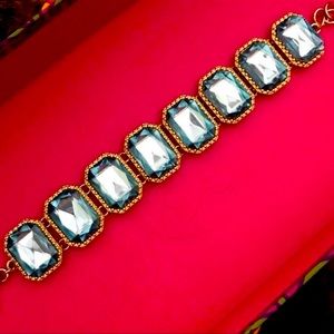 J. CREW BRACELET. BEAUTIFUL WITH GORGEOUS ICE BLUE STONES WITH GOLD TRIM…